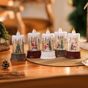 LED Christmas glitter water candles with Santa and Snowman figures in warm light