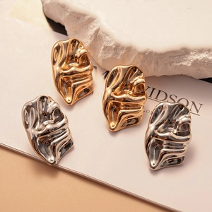 Modern irregular crumpled square metal stud earrings in gold and silver finishes