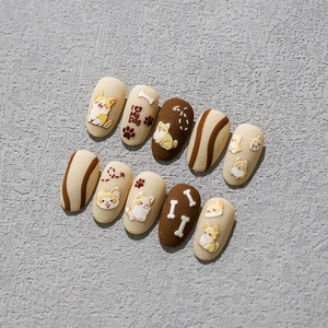 3D embossed 5D nail art stickers with Corgi dog, bone, and heart patterns in warm beige
