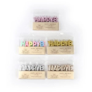 Matrix display of colorful Happy Birthday letter candles in various metallic finishes
