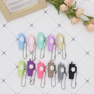 Colorful mini silicone cup keychains with daisy patterns and metal bead chains