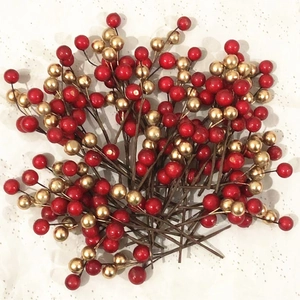 Artificial red and gold berry sprigs for wedding candy box and holiday home decoration