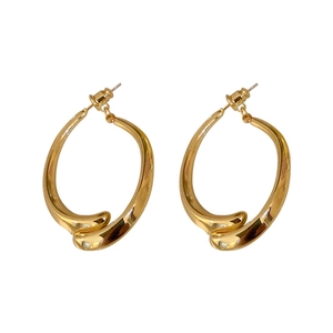 Chic golden twisted metal hoop earrings with a liquid texture for women