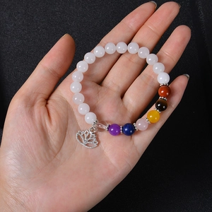 Colorful natural stone beaded yoga bracelet with a detailed silver lotus charm
