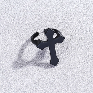 Macro detail of gothic black oil-drip cross ring with adjustable open band design