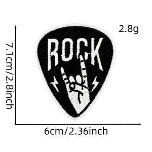 Detail shot of black and white rock music embroidered patch showing dimensions and fabric texture