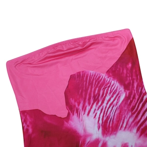 Close-up of pink floral strapless dress showing smooth fabric texture and stitched hem