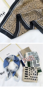 Detailed close-up showing leopard print and geometric patterns on silk neck scarves