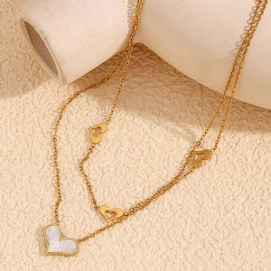 Double-layer 18K gold plated stainless steel necklace featuring heart pendants and mother of pearl