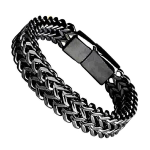 Men's double-row woven stainless steel keel bracelet with black magnetic clasp on white backdrop