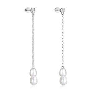 Macro detail of S925 sterling silver stamp on long tassel earrings with pearls