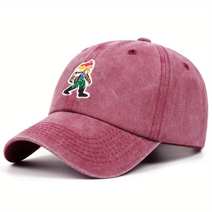 Close-up of vintage washed burgundy baseball cap featuring detailed dwarf embroidery
