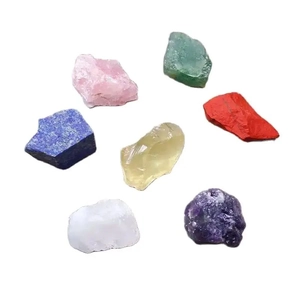 Set of seven raw natural crystal chakra stones and unpolished rough mineral specimens