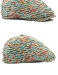 Close-up of geometric woven fabric texture on a retro multi-colored flat cap