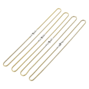 Lot de quatre colliers en chaîne torsadée bicolore or et argent en acier inoxydable