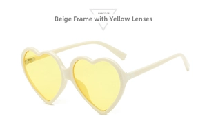 Close-up of beige heart sunglasses with yellow lenses and durable metal hinges