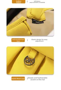 Detail of yellow cotton sun hat showing soft breathable fabric and cool touch inner label