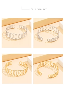 Detailed view of hollow geometric oval bangles in 18K gold and silver finishes