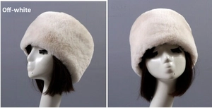 Detail of warm winter faux rabbit fur hats for elderly women in beige and off-white