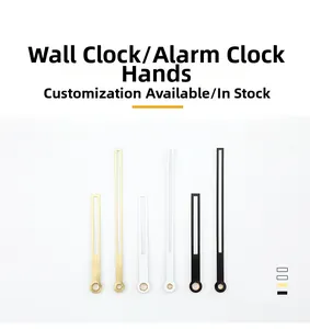 Detailed view of metal clock hands in gold, white, and black for DIY repair and custom watches