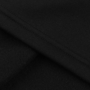 Close-up of black knitted fabric with soft fleece lining and high-quality flat stitching