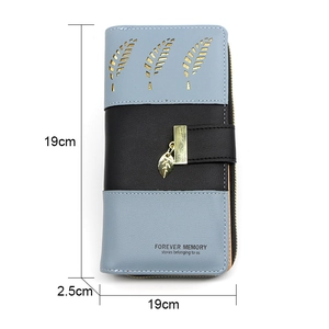 Detailed view of bicolor long wallet with hollow leaf charm and dimensions showing 19cm length