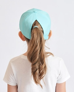 Detail of light blue ponytail baseball cap with a large triangular rear opening for hair