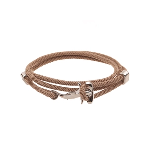 Detail of a brown braided rope bracelet featuring a polished silver anchor metal clasp