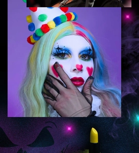 Macro shot of yellow makeup stick for Halloween clown face and body art creative looks