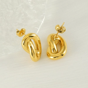 Golden twisted knot stud earrings in minimalist stainless steel with a glossy finish