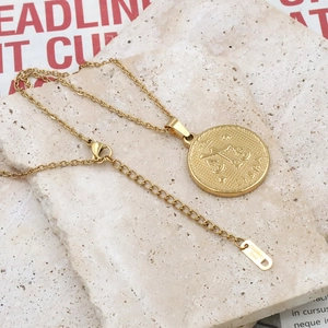 Collier vintage en acier inoxydable plaqué or 18k avec pendentif médaille signe Balance