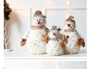Three-piece plush Christmas snowman set in champagne gold and beige with knit hats