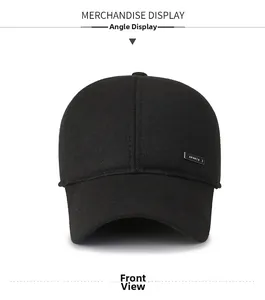 Front view of black sports baseball cap featuring side metal tag with sports text