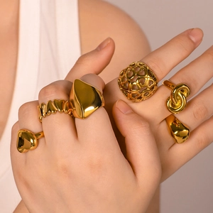 Gold stainless steel geometric open ring set for women featuring hollow heart designs