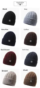 Close-up of thick cable knit texture and folded cuff on warm winter beanies