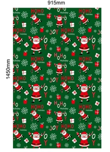 Detailed view of Christmas PE gift bag with Santa, candy cane and snowflake patterns
