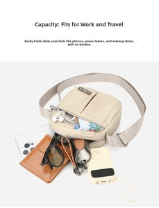Detail showing the spacious internal storage of the nylon crossbody bag with daily items