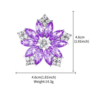 Detail of silver flower brooch with purple crystals showing dimensions 4.6cm and weight 14.3g