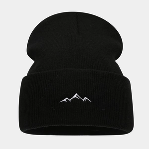 Classic black knitted beanie hat with mountain embroidery for outdoor winter fashion
