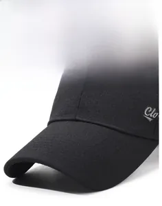 Detail view of reinforced stitching and stiff brim on a black outdoor baseball cap
