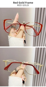 Detail view of red and gold cat-eye metal glasses frame with sleek temples