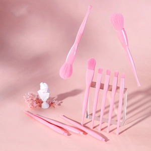 Detailed close-up of 10-piece pink makeup brush set with soft synthetic bristles