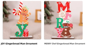 Close-up of wooden Christmas tabletop ornaments with gingerbread men and festive Joy Merry letters