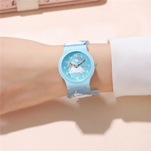 Kids quartz watch featuring colorful unicorn and rainbow patterns on a light blue strap