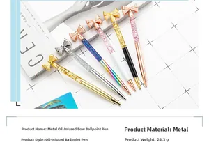 Detail of 24.3g metal ballpoint pens with glitter oil barrel and bow-knot top decor