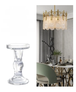 Detail of embossed glass candlestick holder with elegant Roman column texture and patterns
