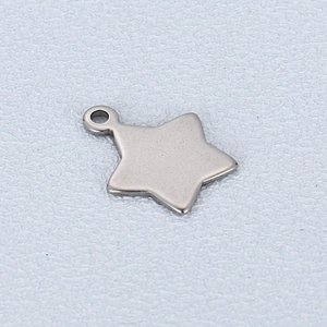 Close-up of a polished silver stainless steel star pendant with a circular ring attachment