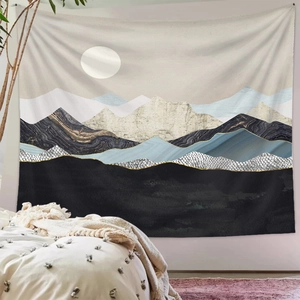 Detail of minimalist mountain landscape wall tapestry in a cozy bedroom setting
