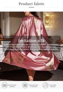 Detail of pink imitation silk bathrobe with golden floral patterns and fabric care guide