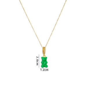 Golden necklace with green gummy bear pendant and crystal detail with size dimensions